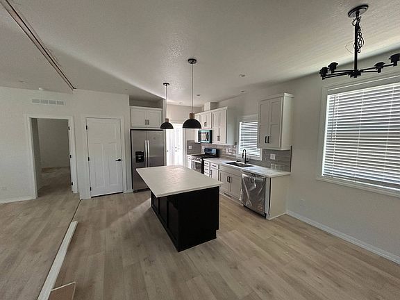 3rd image of 3444 W Center St #5