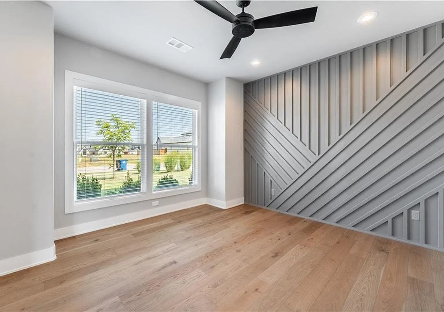 Quality built with beautiful modern fixtures, stunning accent walls, custom cabinets, quartz coun... — Photo 3