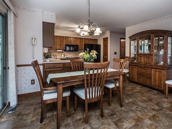 Kitchen/Dining area, showing the glass doors to the sun porch