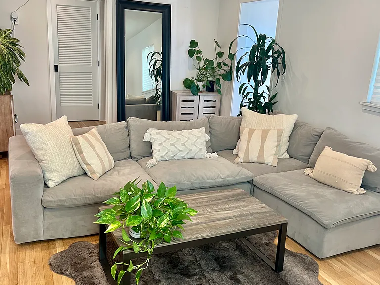 Living Room: Comfortable sectional perfect for relaxing with plenty of seating