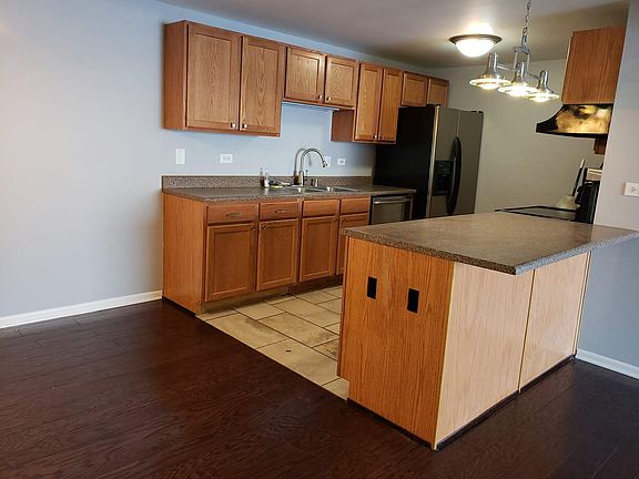 Spacious kitchen, ample storage, freshly painted with newly tiled floor