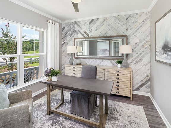 Optional French doors open to flexible space that can be utilized as a study or home office.