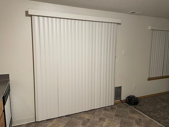 Kitchen Area Vertical Blinds to Private Deck