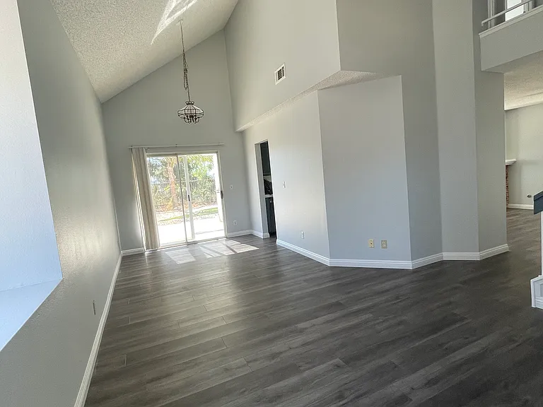 in entry looking towards back, dining room, living room