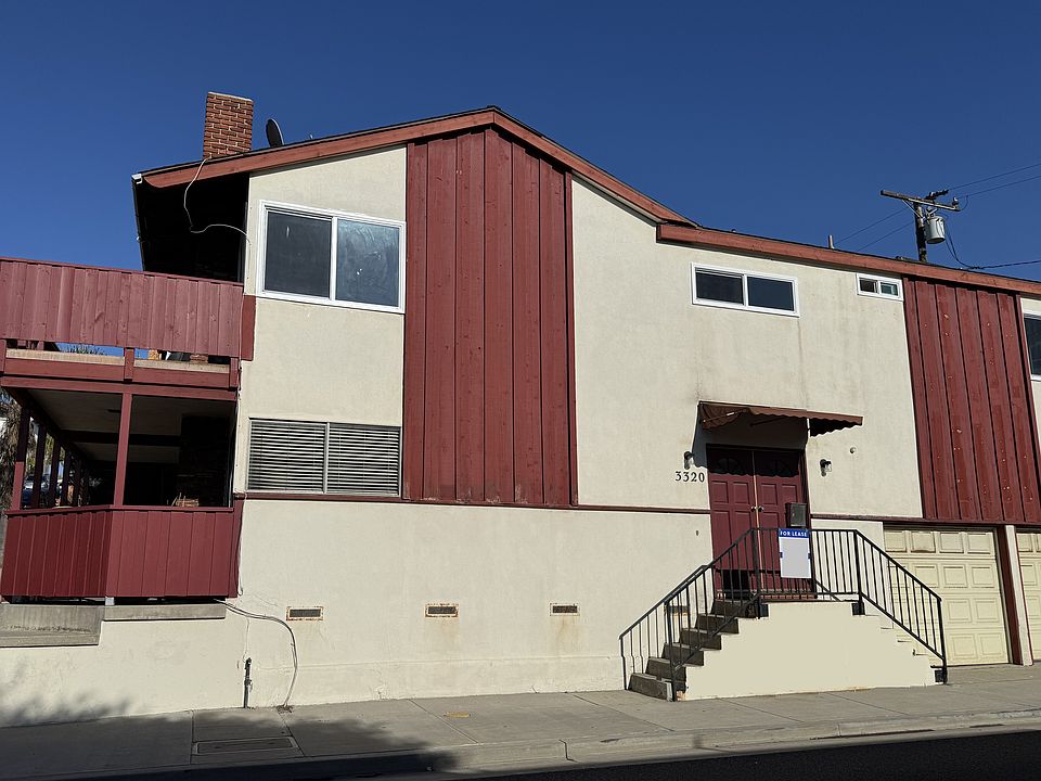 Secured entrance to building and large 2-car garage