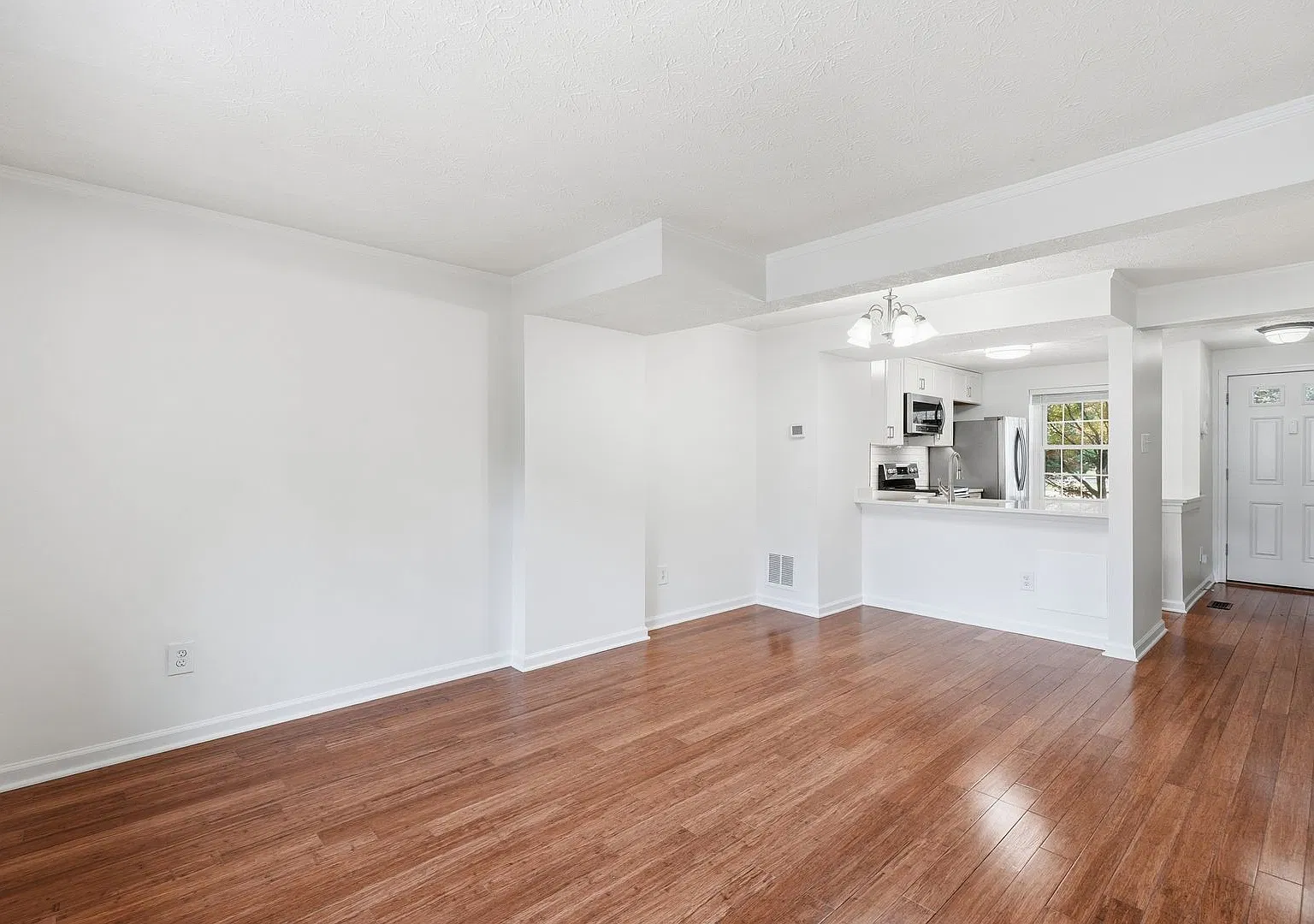 Welcome home to 12147 Purple Sage Court, a charming end-unit townhome tucked away on a quiet cul-... — Photo 4
