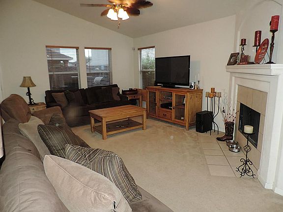 View of Open Den with Fireplace