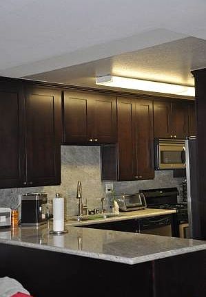 Kitchen has been remodeled with new cabinets and granite cou