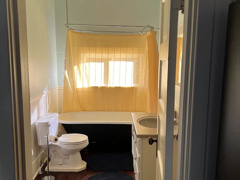The main bathroom is on the main floor and features a clawfoot tub/shower.