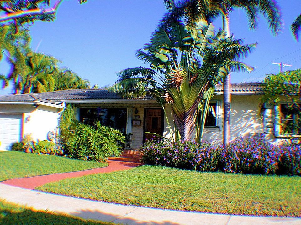 Lush Landscaping Surroung the Home