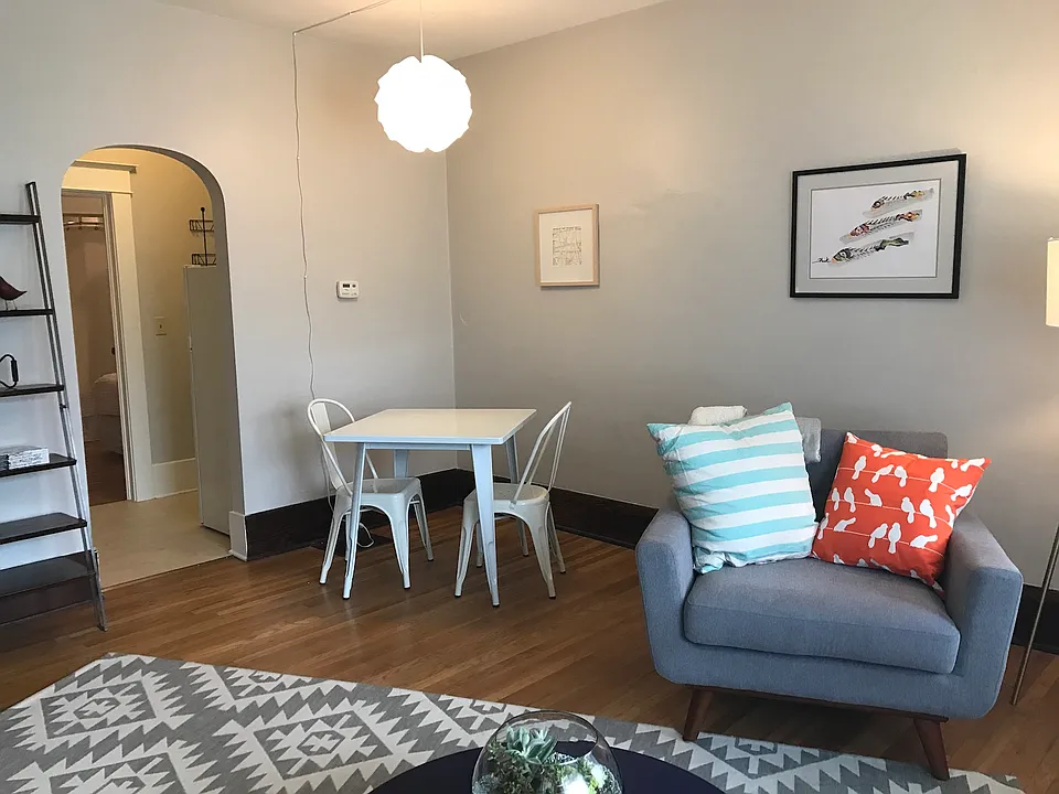 Front room leading into kitchen.