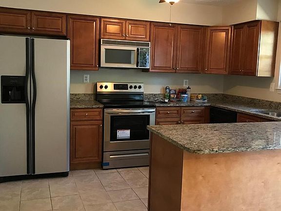 Granite, Stainless Steel, with beautiful cabinets!