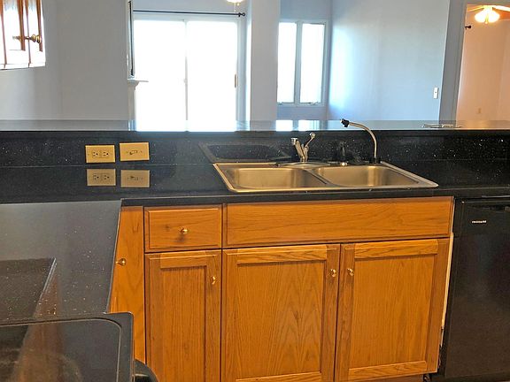 Kitchen Open to Great Room, Granite Counter Tops and Full Size Food Pantry Storage