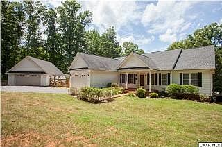 Two car attached plus two car detached garage!