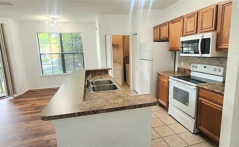 6171 Metrowest Blvd #107 — Photo 26