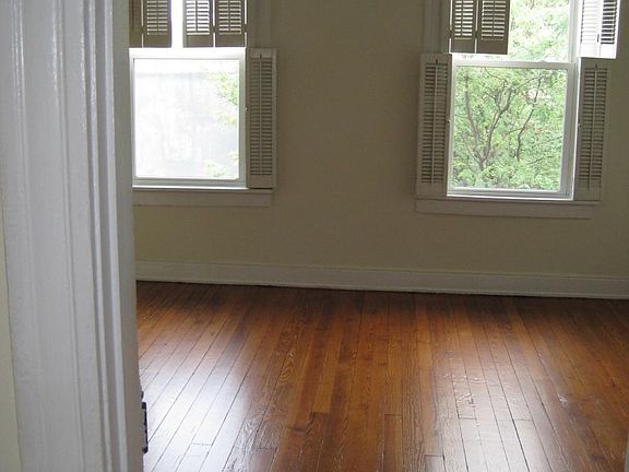 FRONT ROOM: Generous Space & Light _ Fits a king bed with room to spare, plus great natural light.