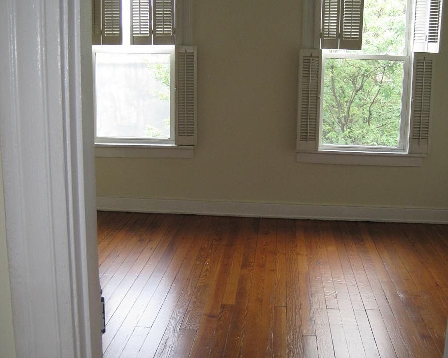 FRONT ROOM: Generous Space & Light _ Fits a king bed with room to spare, plus great natural light.
