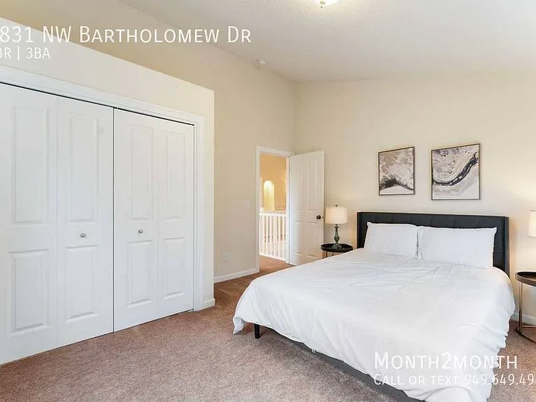 9831 NW Bartholomew Dr — Photo 14
