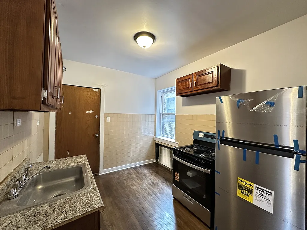 Building Photo - 7149 S Constance Ave #W3