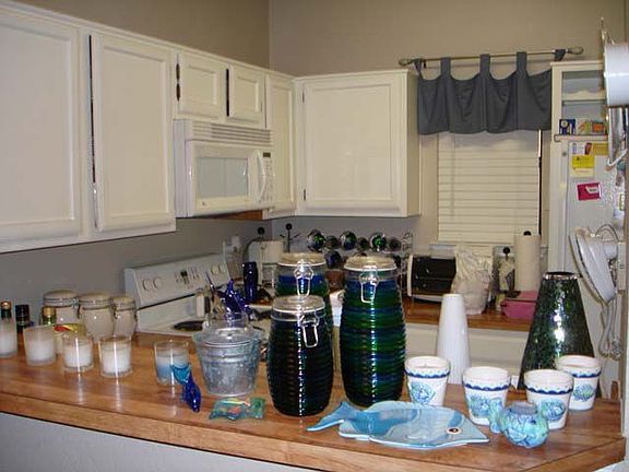 Kitchen is spacious with breakfast bar.