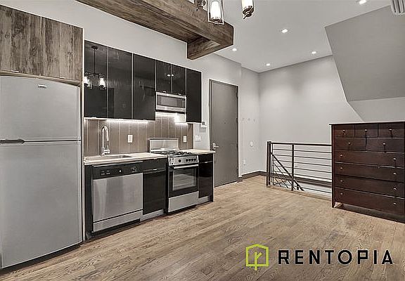 2nd image of 200 Scholes St APT 1C