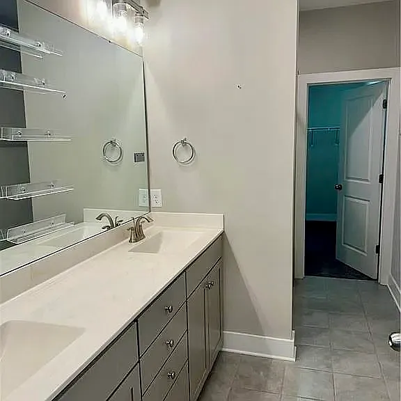 Double vanity primary suite bathroom