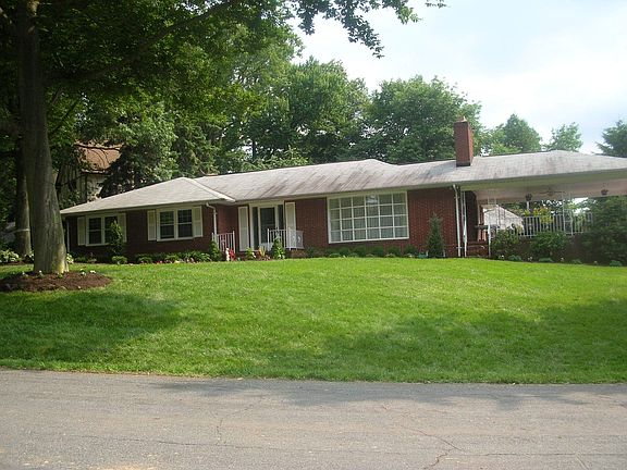 Sprawling rancher with professional landscaping