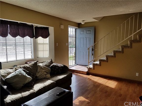 South facing windows.. View from the living room facing the front door and stairs..