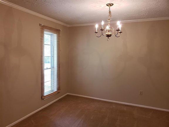 Formal Dining Room with Crown Molding.