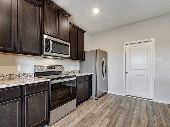The spacious kitchen is perfect for preapring your family s favorite meals and treats.