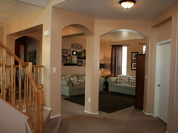 view of arches & living room