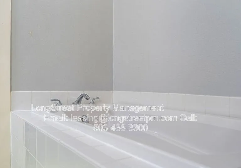 10247 NW Village Heights Dr — Photo 39