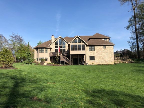 one acre with woods out back, such a fabulous setting