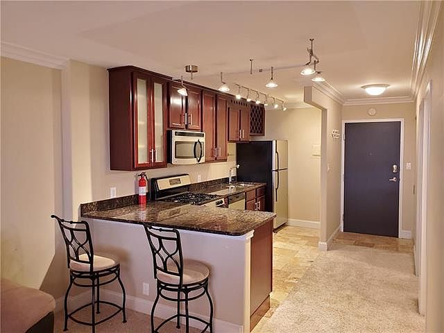 1st image of 700 E 8th St Unit 12-L
