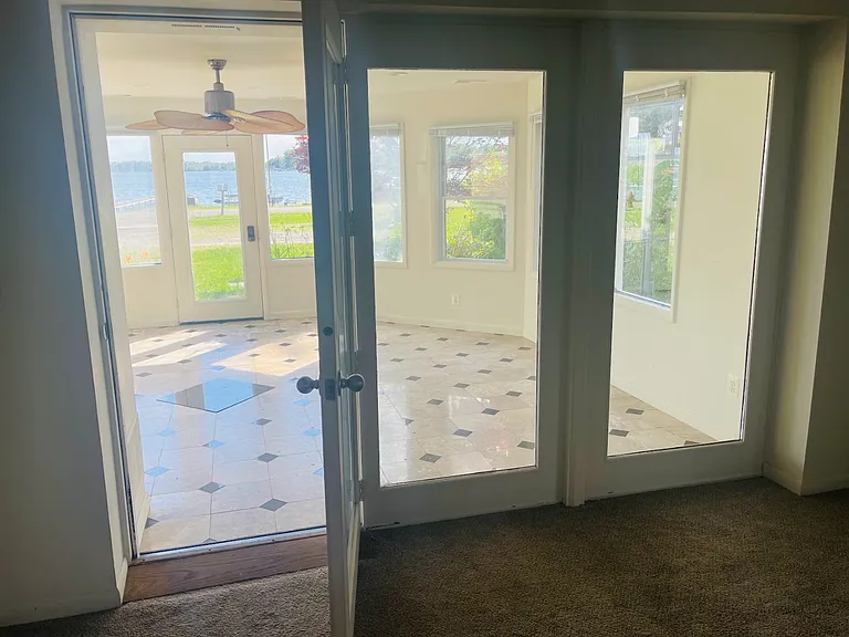 Standing in the living room you can look out and see the lake