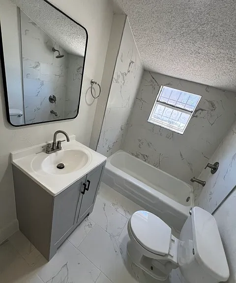 renovated bathroom with tub/shower combo