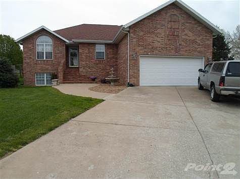 Great buy in quiet cul-de-sac of Oakmont Heights. All brick, 5 bedrooms. New hardwood flooring and custom paint finish in living room. Vaulted formal dining, spacious kitchen dining,new stainless steel appliances including refrigerator. Fireplace and wet bar in basement. Amazing large storage area in garage with easy access. Unbelievable storage in garage! Oh what a deal!