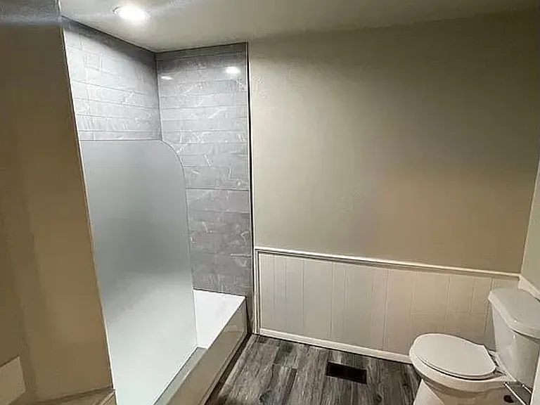 renovated primary suite bathroom