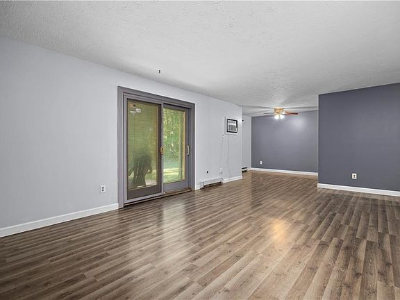 living room with walk out to patio