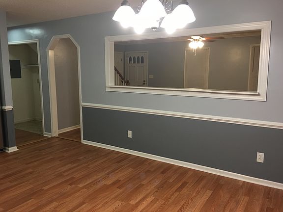 kitchen view of living room and front door