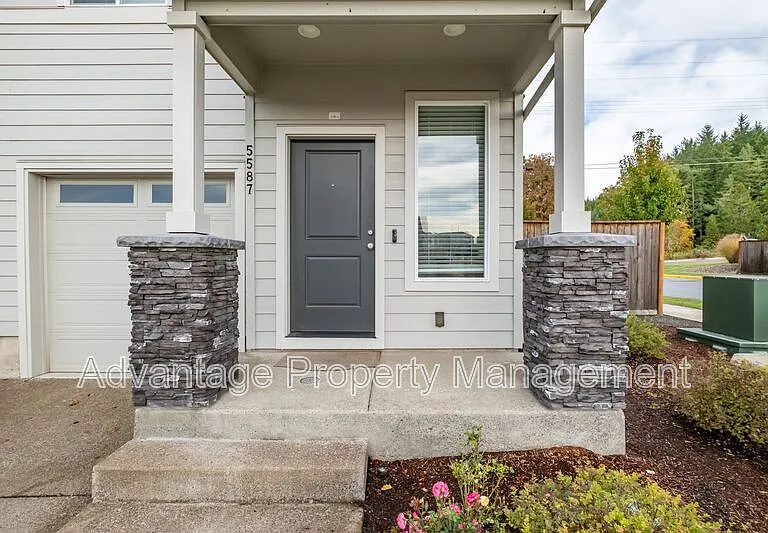 5587 NW Torchcrest Pl — Photo 6