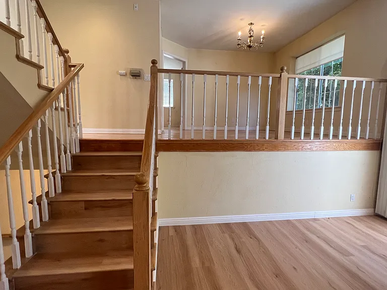 Stair to den and kitchen