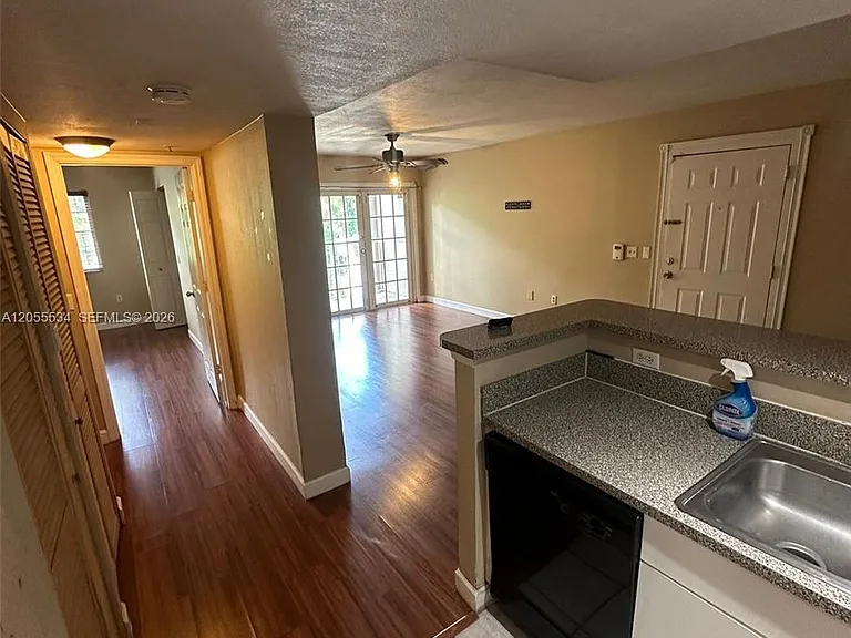5035 Wiles Rd #203 — Photo 5