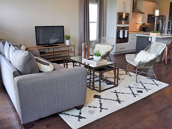 Large living room area open to kitchen and separate dining a