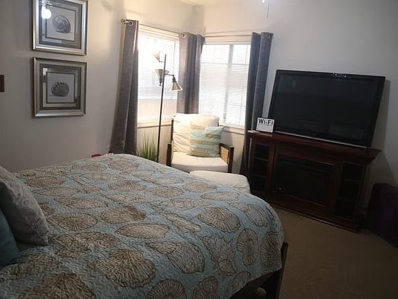 Large new smart tv and sitting area