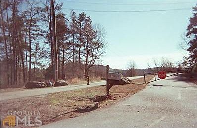 Park with walking and bike trails next to property.