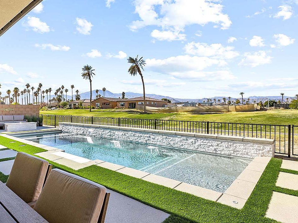 This sparkling saltwater pool is the perfect place to relax and enjoy the beautiful scenery.