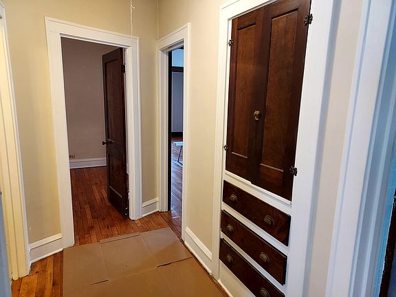 hallway w/linen cabinet