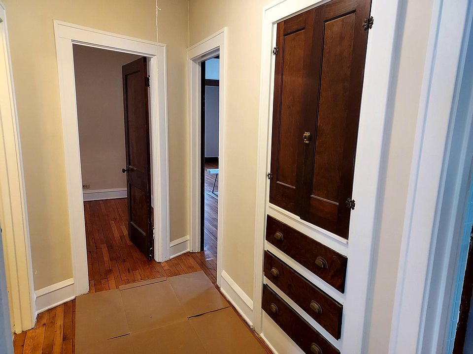 hallway w/linen cabinet