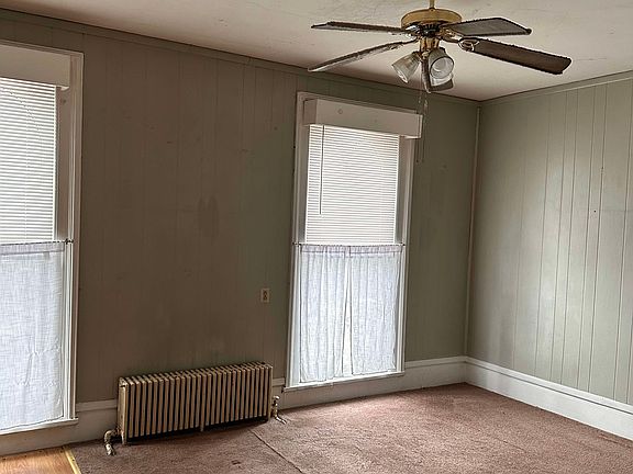 Large open kitchen & dining/living room space.